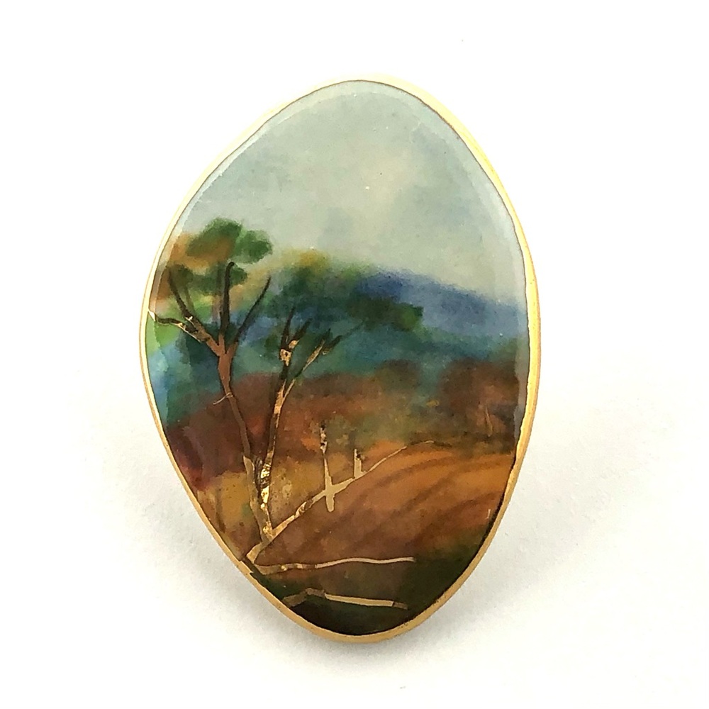 Sylvain Filion vintage porcelain brooch with hand painted landscape